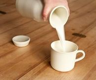 Mjölkkanna med kopp